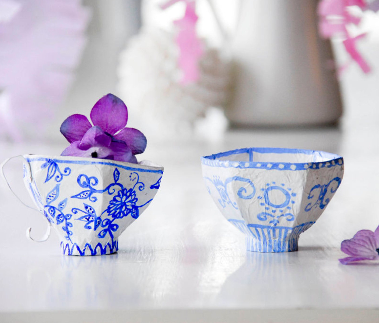 Colorful Paper Mache teacup On The Table.