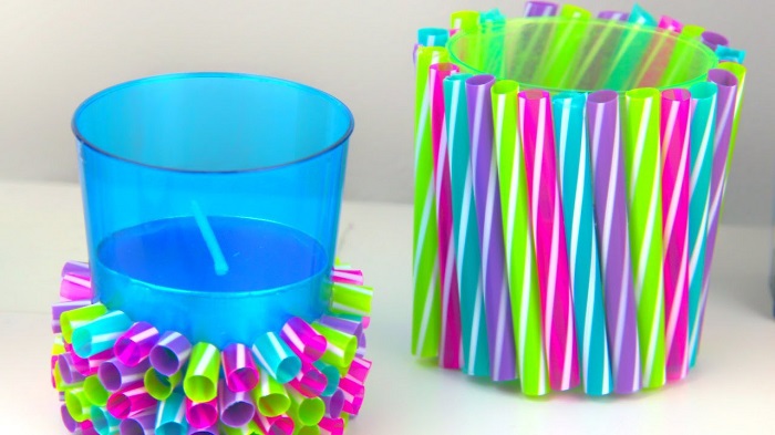 Two Little Holders With Colorful Straws.